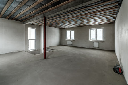 Repairs in the building. Building with a metal staircase at the time of renovation. Construction site in the house without people. Construction of a new house. construction and architecture.の写真素材