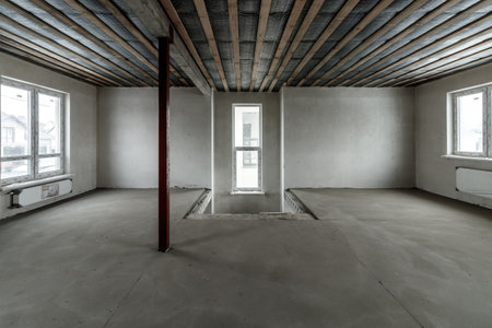 Repairs in the building. Building with a metal staircase at the time of renovation. Construction site in the house without people. Construction of a new house. construction and architecture.の写真素材