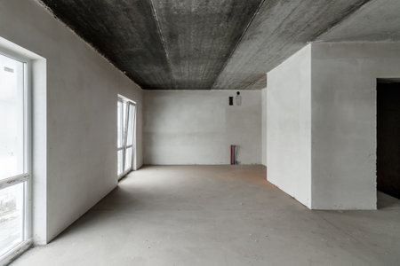 Repairs in the building. Building with a metal staircase at the time of renovation. Construction site in the house without people. Construction of a new house. construction and architecture.の写真素材
