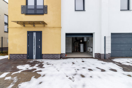 houses in residential community after snow in winter.の写真素材