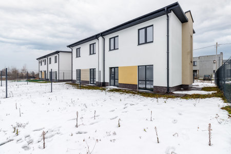houses in residential community after snow in winter.の写真素材
