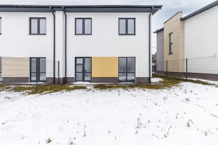 houses in residential community after snow in winter.の写真素材