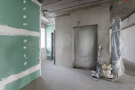 Spacious empty rooms in the attic floor after filling out the work on the wall and ceiling.の写真素材