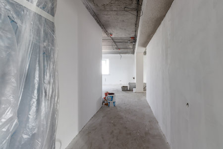 Spacious empty rooms in the attic floor after filling out the work on the wall and ceiling.の写真素材
