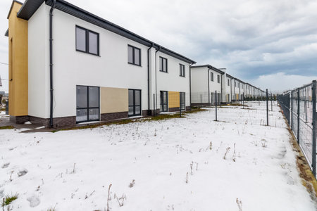 houses in residential community after snow in winter.の写真素材