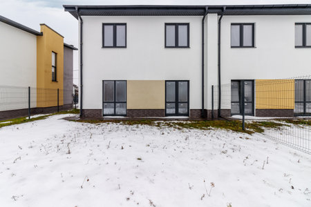 houses in residential community after snow in winter.の写真素材