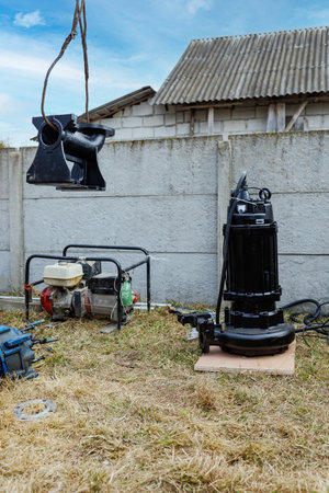 New pump for pumping feces. Replacing an Old Faulty Pump with a New One.の写真素材
