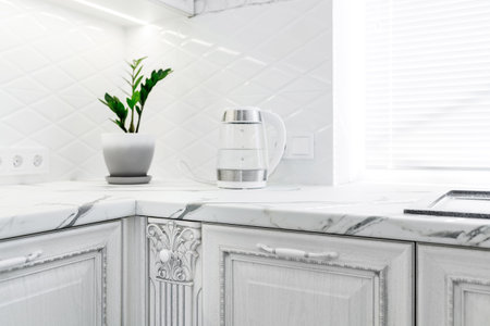 Decorative elements on the kitchen cabinets of the white modern kitchen.の写真素材