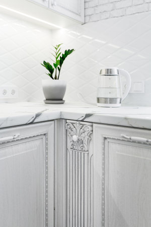 Decorative elements on the kitchen cabinets of the white modern kitchen.の写真素材