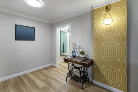 Fragment of a modern renovated room with a white doorway and an old table.の写真素材