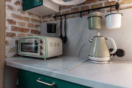 Retro-style kitchen appliances in a modern kitchenの写真素材