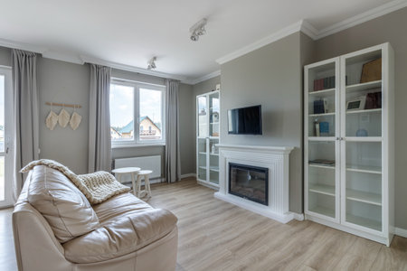 White, modern open space with wooden furniture set.の写真素材