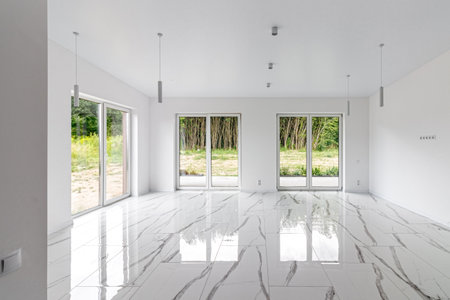 Interior of empty apartment, wide room with marble floorの写真素材