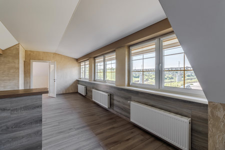 Indoor view of an empty attic of a new modern houseの写真素材