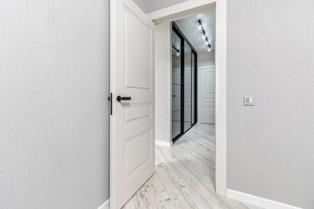 White modern interior in a new apartment, white interior doors.の写真素材