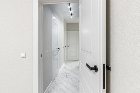 White modern interior in a new apartment, white interior doors.の写真素材