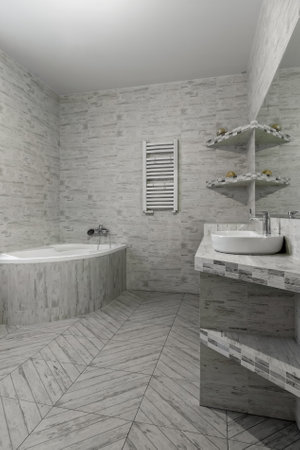 Modern bathroom with white corner bathtub, sleek sink, geometric floor tiles and minimalist shelving in soft gray tones.の写真素材