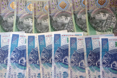 close up on polish zloty one hundred and fifty notes background