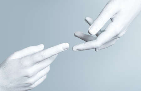 photo of a colored hand isolated on whiteの写真素材