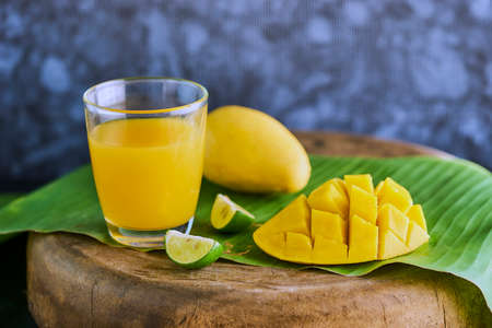 Fresh mango shake with mango fruitの写真素材