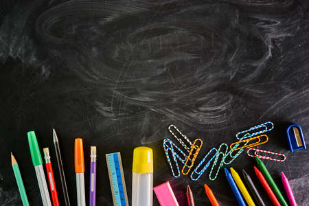 School supplies on blackboard, Back to School background.の写真素材