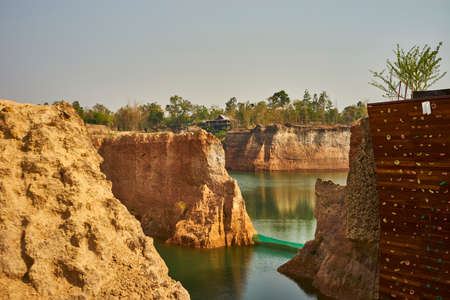 Cliffs in a lake and climbing wallの写真素材