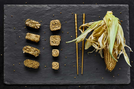 Luxury Golden Sushi Set on black stone slate plate boardの写真素材