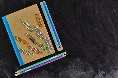 School supplies on blackboard, Back to School background.の写真素材