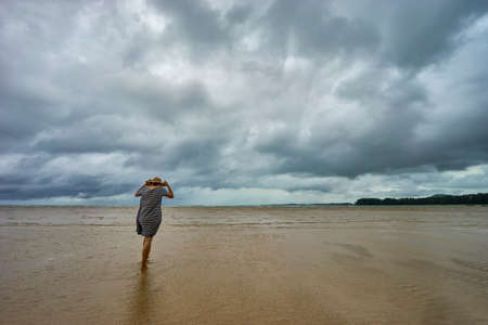 person fighting windの写真素材