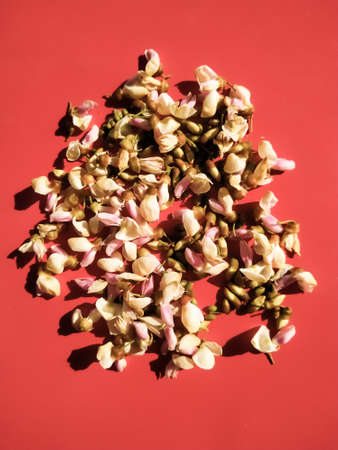 Small beautiful flowers placed on the table background for decorationの写真素材