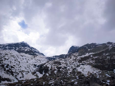 Selective focus clouds over the mountainsの写真素材