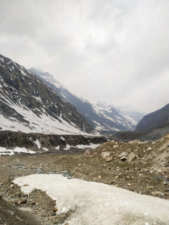 A beautiful landscape with snow and mountains