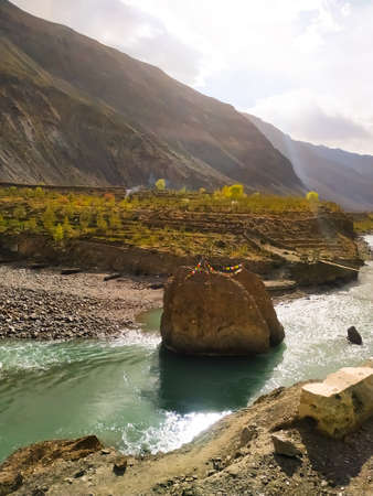 Mountain landscape river stream valley in autumn scene. River in mountain valley. Travel in Himalayasの写真素材