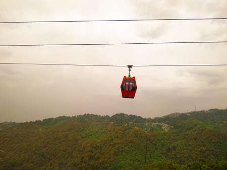 Amazing view of cable car on the green mountainの写真素材