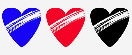 Three broken hearts in different colors on a white background. Love concept.の写真素材