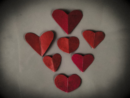 Red hearts on a gray background. Valentine's Day. Toned.の写真素材