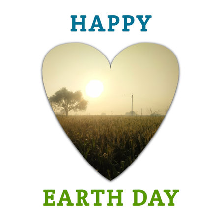 Happy Earth Day concept with heart shape over wheat field and tree. illustrationの写真素材
