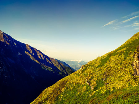 beautiful mountain landscape with blue sky and white clouds on the backgroundの写真素材