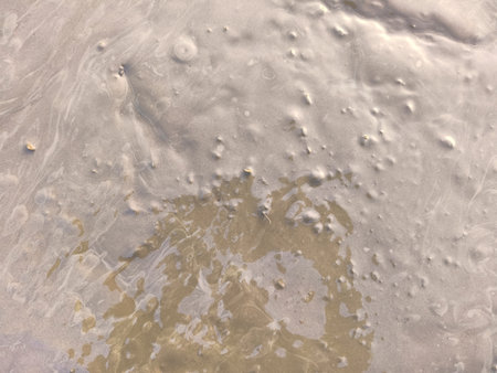 Close up shot of wet shiny mud