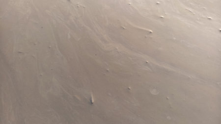 abstract background. texture of the foam on the water surface. sand and waterの写真素材