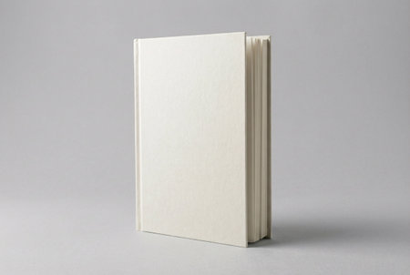 Blank book cover isolated on white background. Clipping path included.の素材