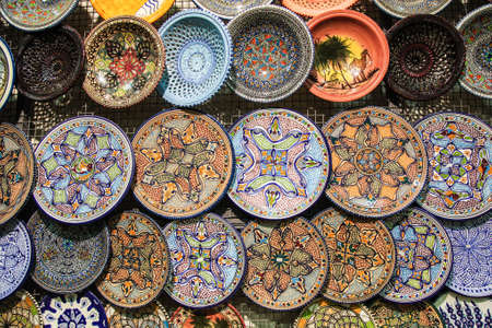 Handcrafted traditional  plates and pottery  souvenirs from Tunisiaの写真素材