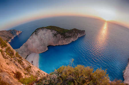 Beautifull sunset at Navagio Bay in Zakynthos, Greece, the place of the most known shipwreck in the worldの写真素材