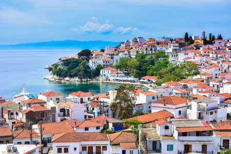 Skyathos island panorama with white houses and small pedestrian streets. Main island in the Ionian...