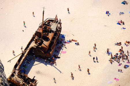 Tourist visiting Navagio Shipwreck Panagiotis in Zakynthos island, Greece.の写真素材