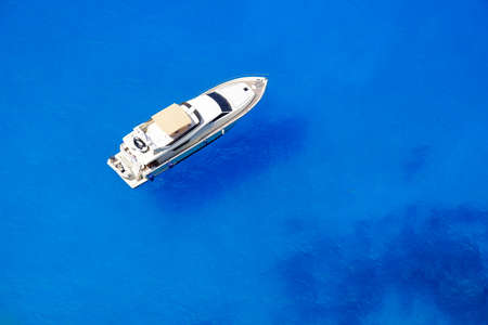 Yacht anchored at sea in Greece near Zakynthos Islandの写真素材