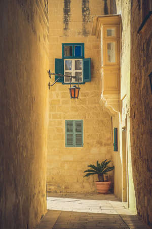 Mdina city streets - Malta. Famous narrow streets in the old citadel at sunsetの写真素材