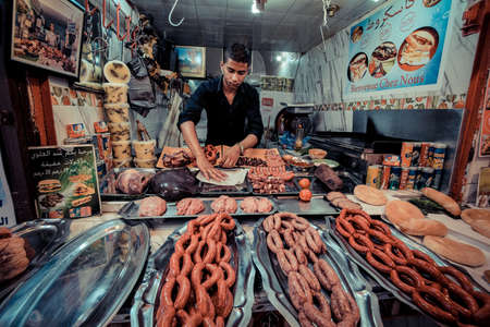 FEZ, MOROCCO, JUNE 2016: traditional shop in the old market. Street vendor in the old medinaのeditorial素材