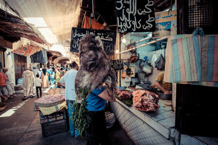 FEZ, MOROCCO, JUNE 2016: traditional shop in the old market. Street vendor in the old medina