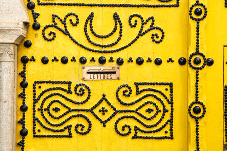 Traditional Tunisian door in Tunis, the capital of the islamic country.の写真素材